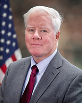 Interim Chief Executive Officer Lee J. Lofthus