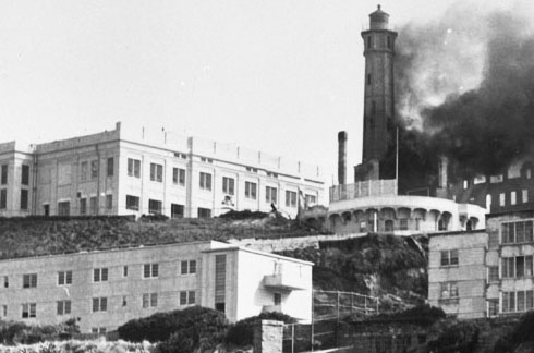 A building burns during the Native American occupation