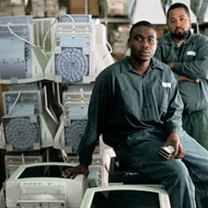 photo of two people working in the Recycling Business Group