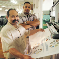 photo of two people working in the Services Business Group