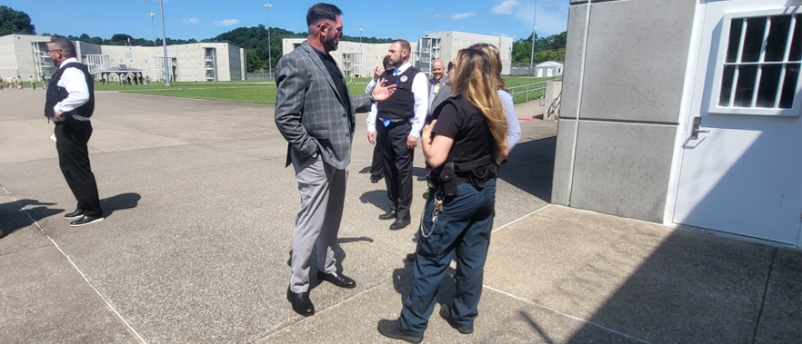 Director Marshall speaking to staff on the compound at FCI Gilmer